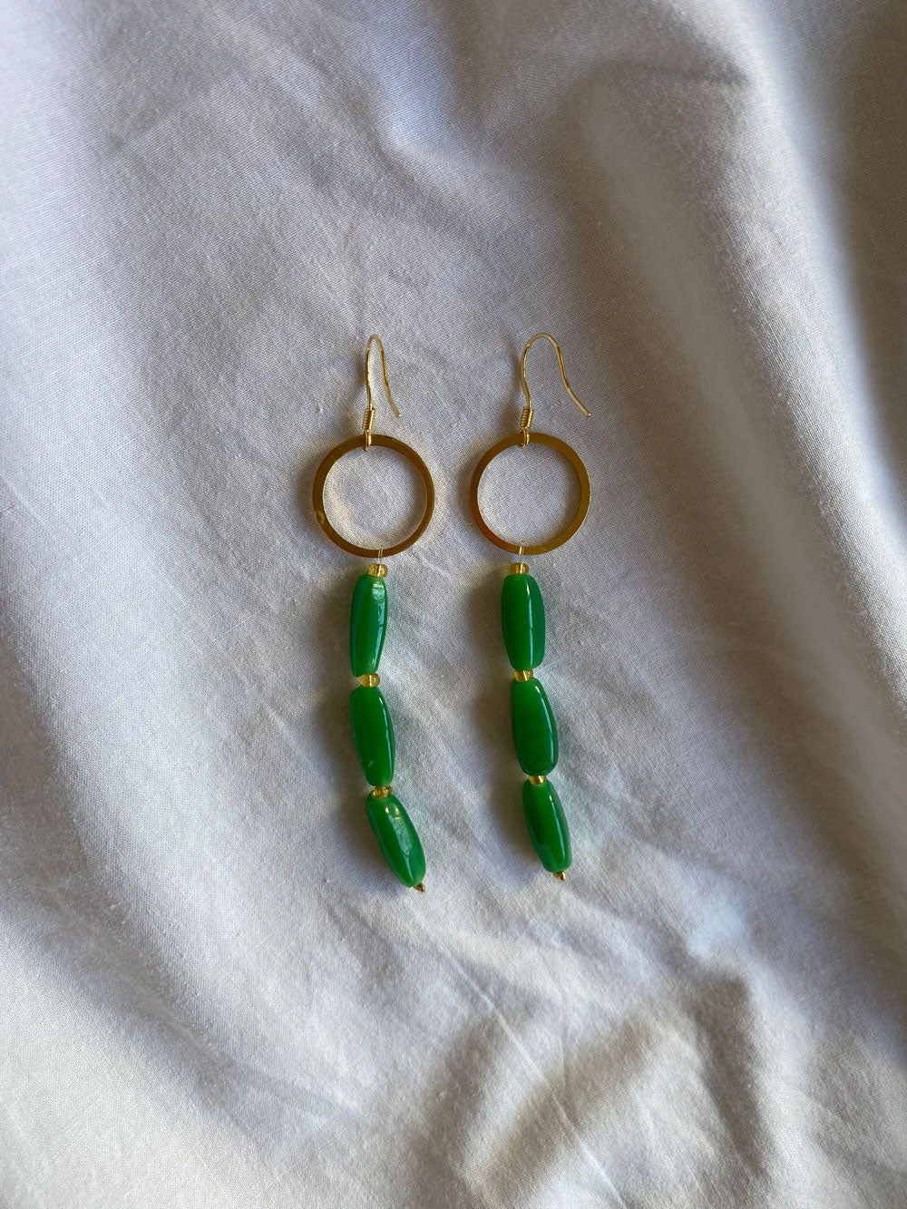 Glass beads earrings in green