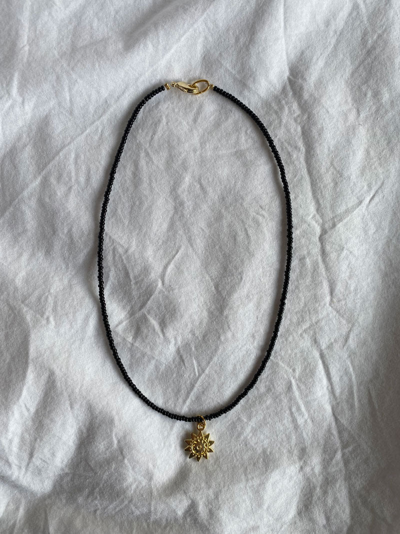 Soleil in black necklace