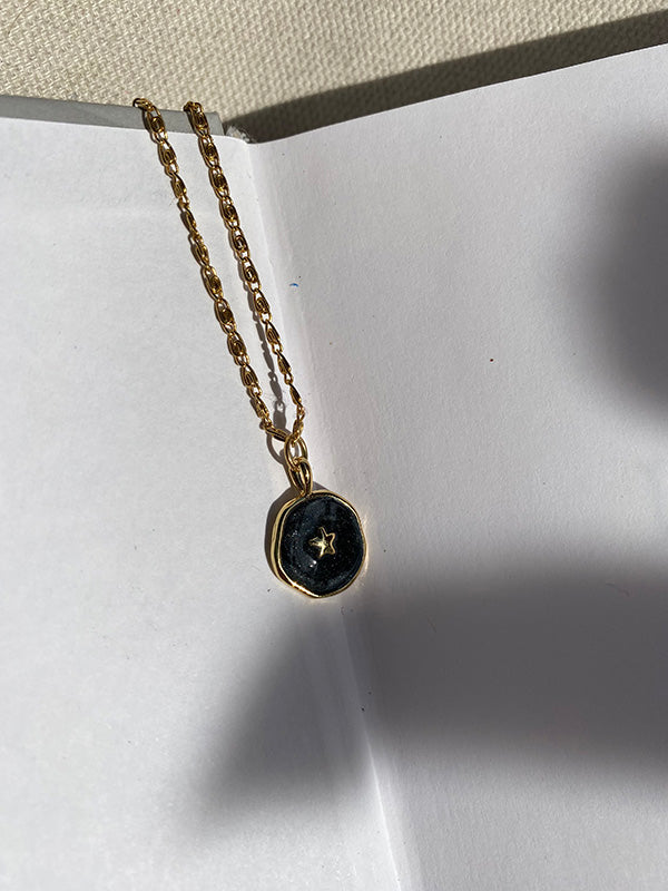 Black star necklace