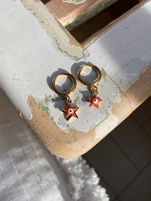 Orange star earrings