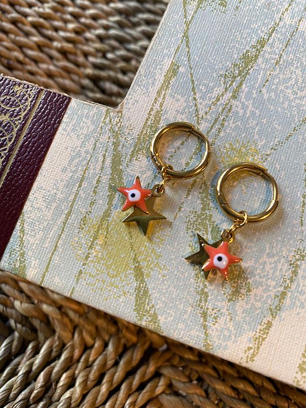 Orange star earrings