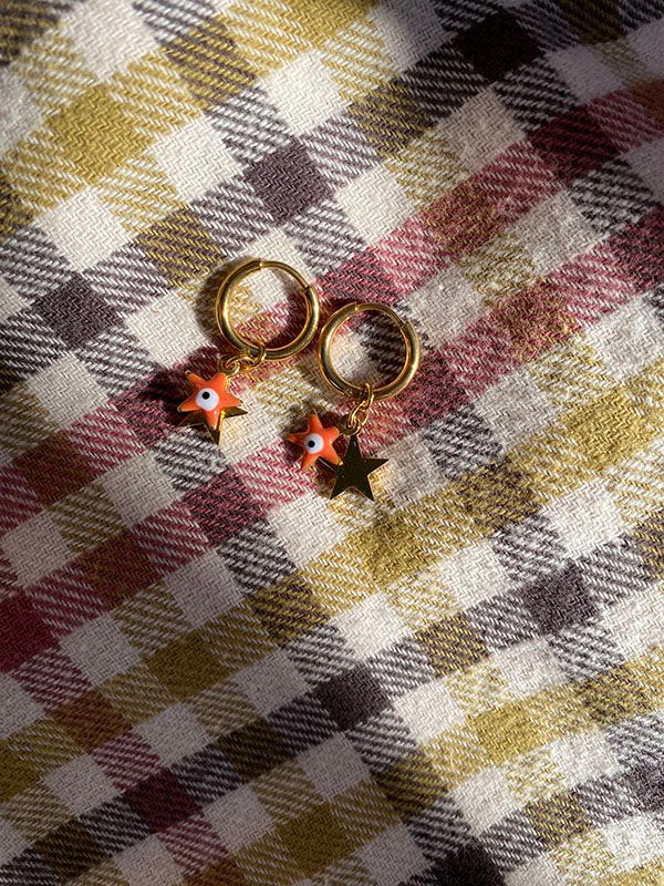 Orange star earrings