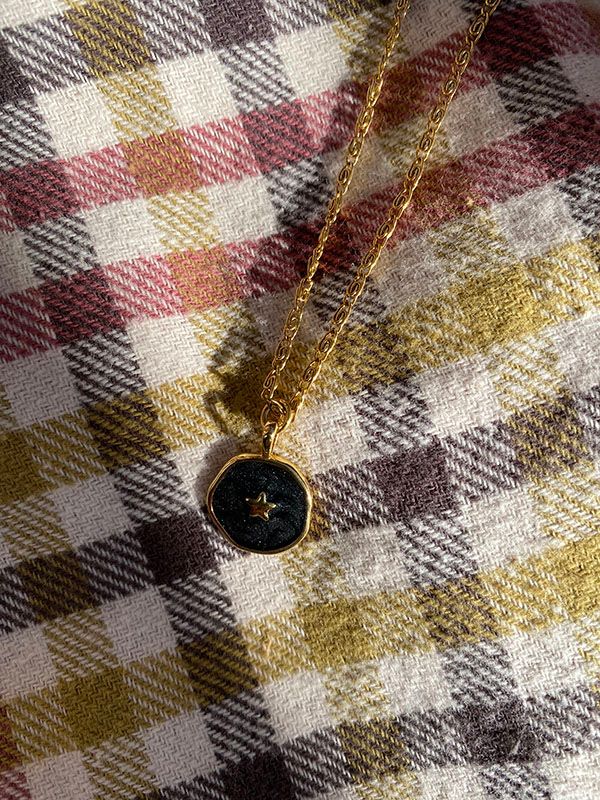 Black star necklace